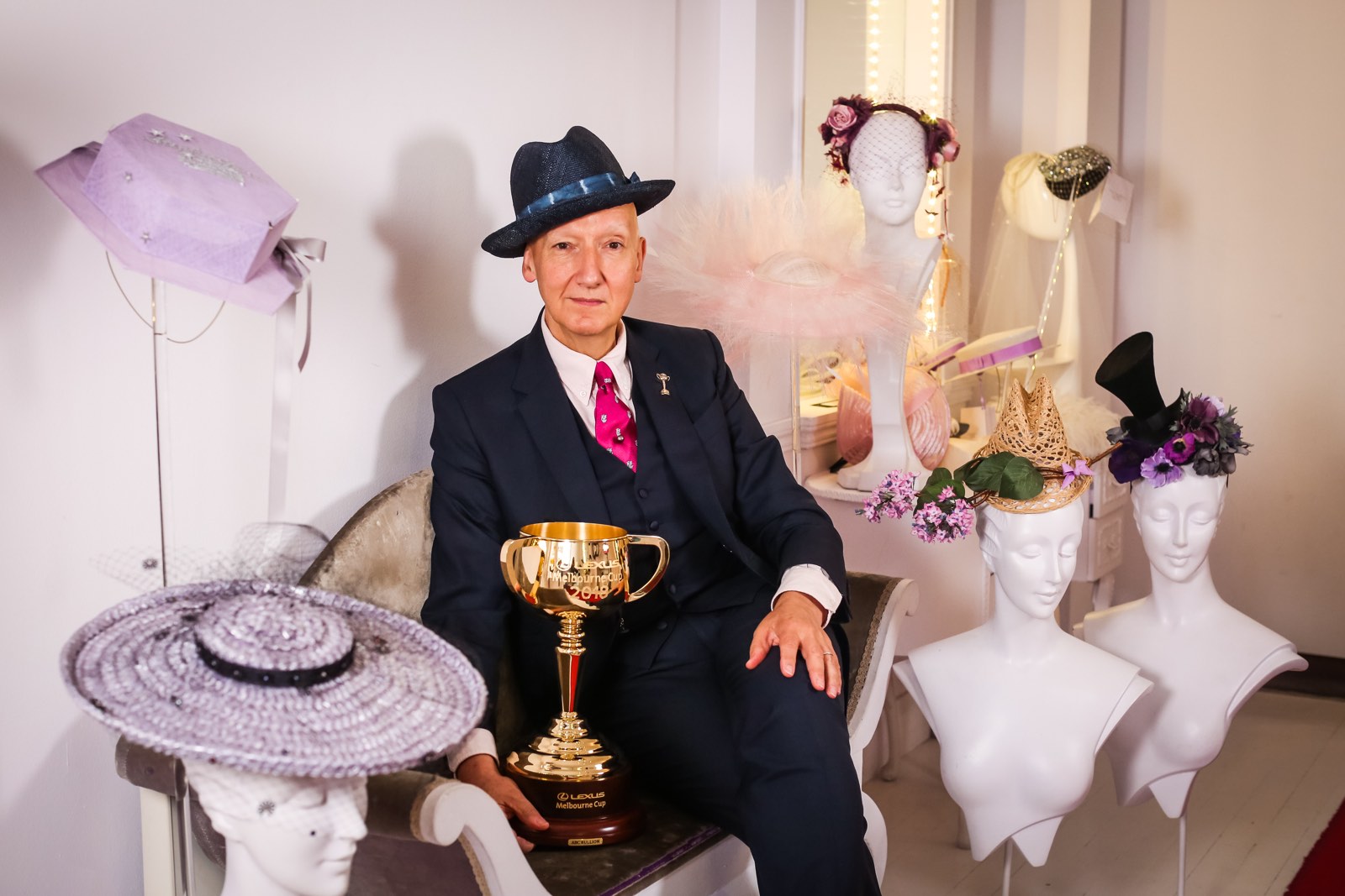 Milliner Stephen Jones OBE with the Lexus Melbourne Cup in his Covent Garden studio. Image: Karon Photography