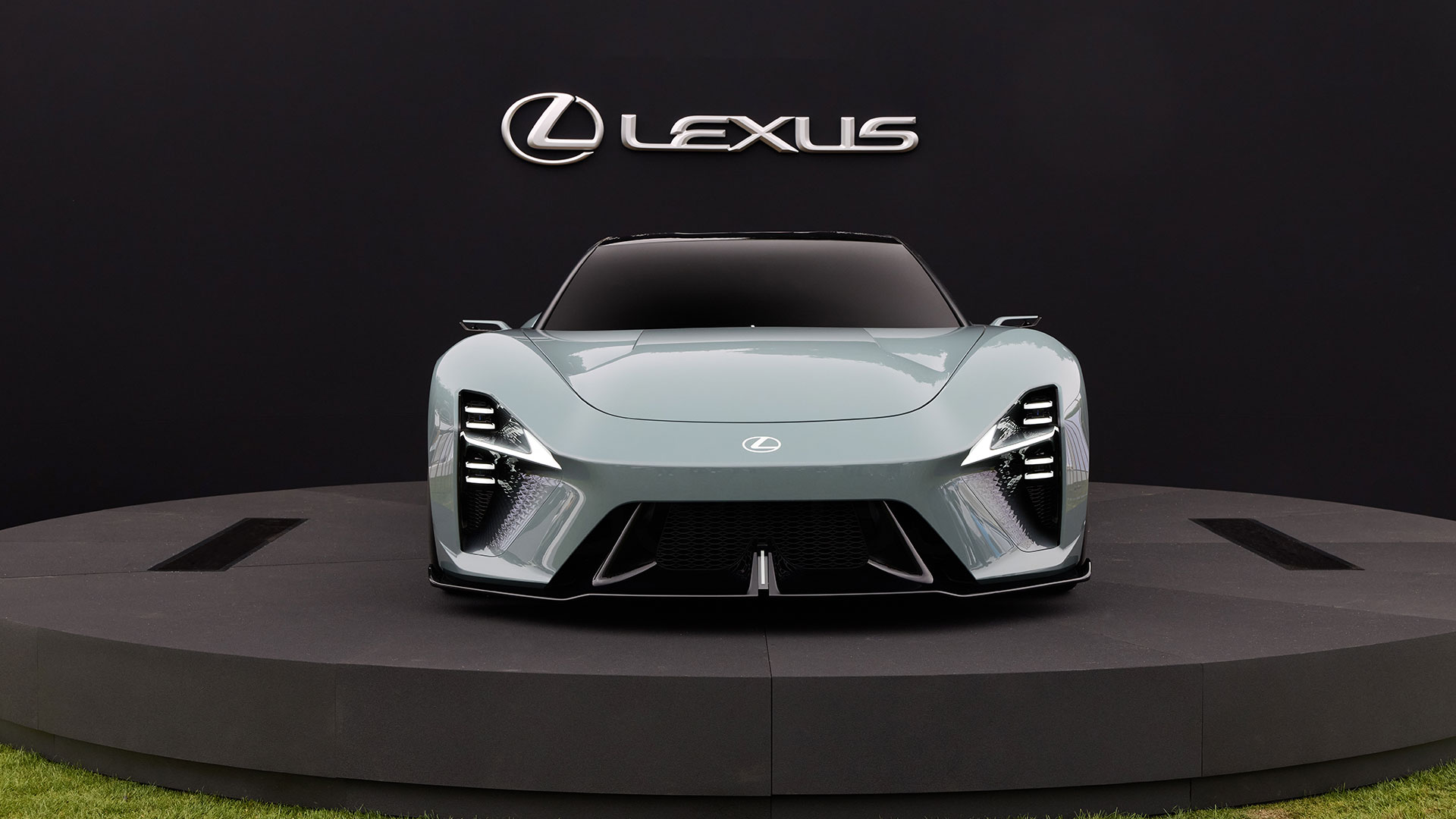 Metallic grey Lexus Sport Concept displayed on a raised platform
